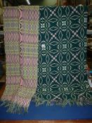 A single Welsh Wool blanket, green/pink colour.