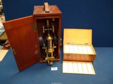 A boxed brass Microscope with double optics, signed and numbered, Ross, London, no.