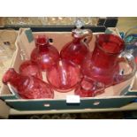 A quantity of Cranberry glass including bowl, vases, decanter, jug, etc.