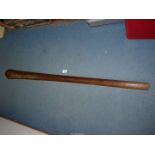 A Solomon Islands hardwood Paddle Club of elongated spatulate form with raised medial ridge,
