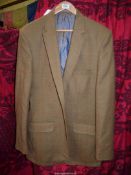 A light weight tweed jacket by Samuel Windsor in a green check. size 42" chest.