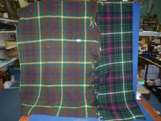 Two wool travel Blankets, one being green and navy tartan by Witney and the other being a brown,