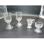 Four old glasses including two Rummers with drop knop and wide foot,