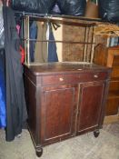 A 19th century Mahogany Chiffonnier/sideboard having a pair of opposing doors and with a pair of