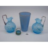 A small quantity of glass including jugs with fluted rim and white floral design,