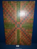A collection of Stamps stuck on board in Union Jack pattern, 22 1/2'' x 14''.