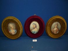 Three contemporary oval portraits of ladies in period dress, all in velvet frames, 9'' long.