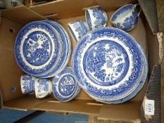 A quantity of china to include Willow pattern, five cups and three saucers and plates.