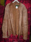 A tan leather Bomber jacket by Hidepark, size 3XL.