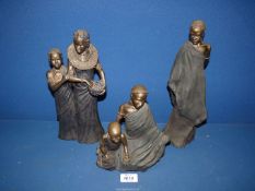 Three individual figures of Massai ladies including one from the Leonardo Collection