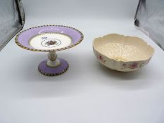 A Spode Comport with floral centre and mauve border with yellow and black foliage rim and a Belleek