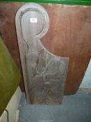A Victorian pine Pew end in relief with a human form, 36" tall x 14".