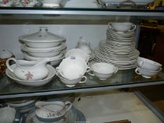 A good quantity of Royal Doulton 'Tumbling Leaves' dinner ware including meat platters,