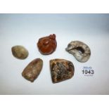 Five small Oriental carved stone animals to include monkey, beetle, bird, etc.