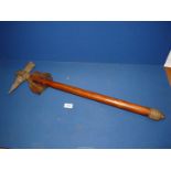 A heavy cast War hammer or tribal ceremonial weapon with decorated head, 30" long.