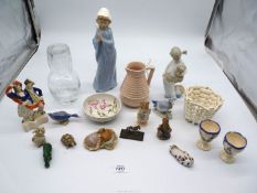 A small quantity of china comprising of a Nao girl praying, Beswick Beatrix Potter mouse,