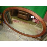 An Edwardian bevel edged oval, satinwood framed Mirror with box stringing detail.