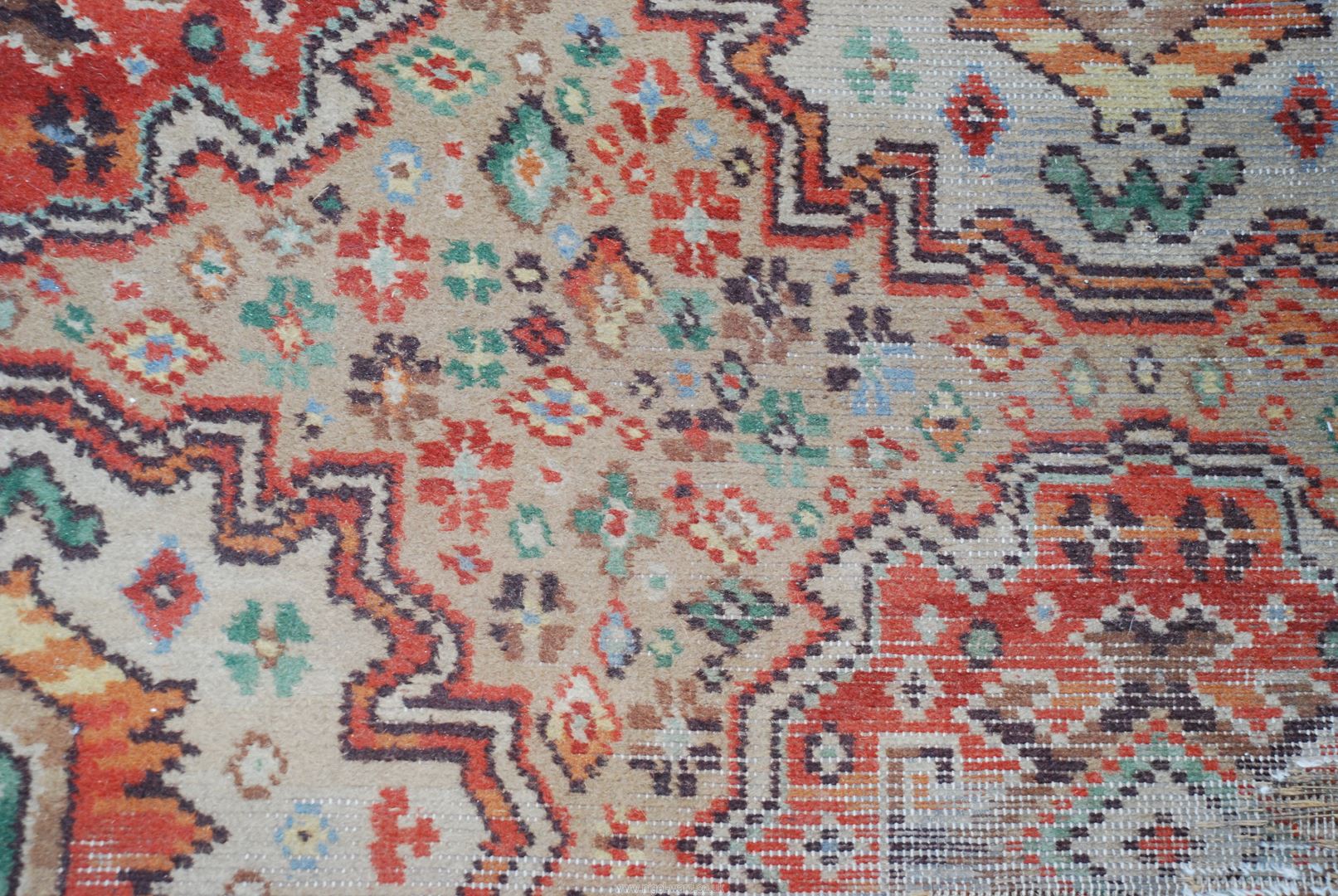An orange and green rug, some worn areas, 122" x 90". - Image 2 of 3
