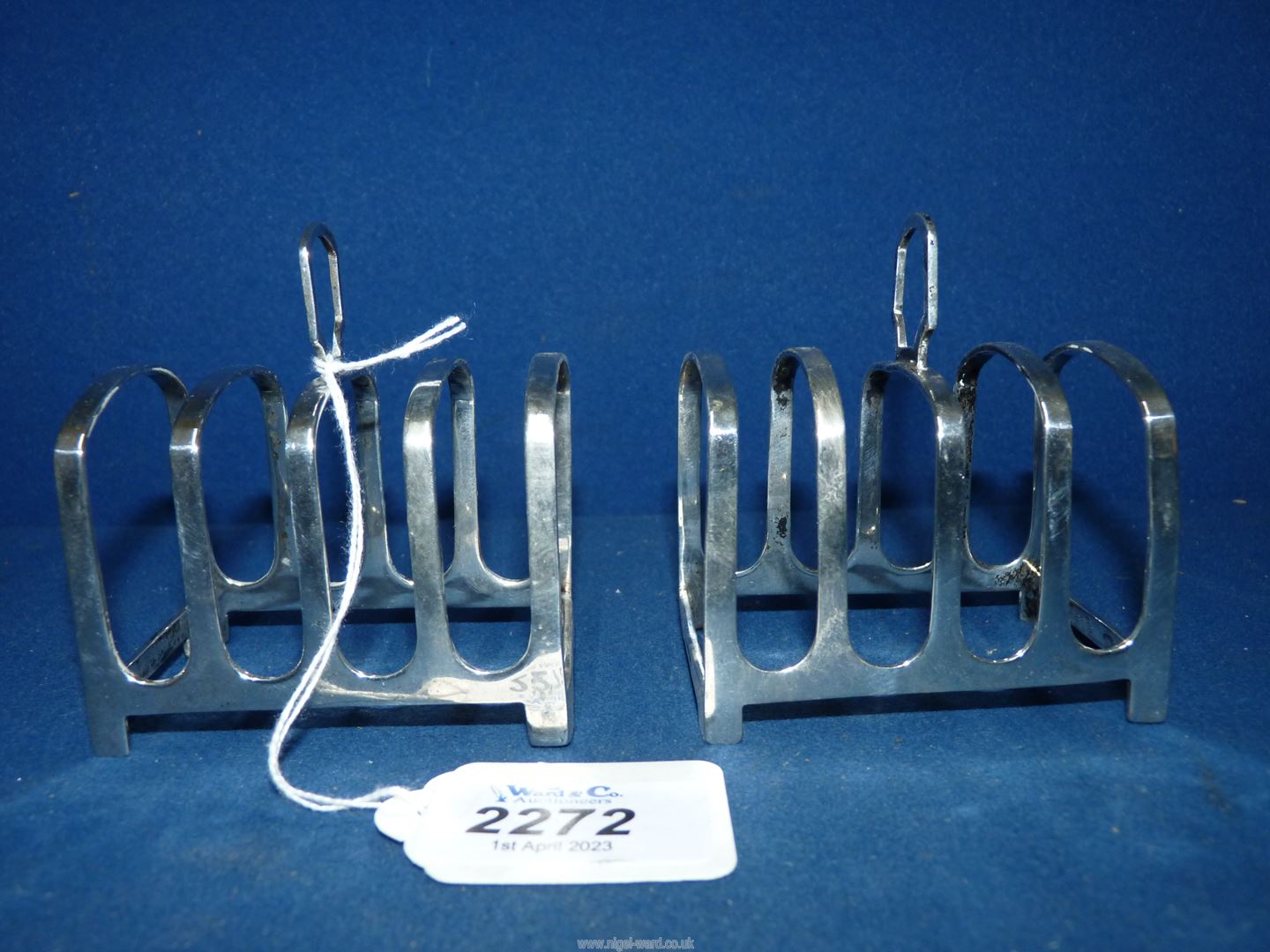 A pair of Silver Toast Racks, Walker & Hall Sheffield, 1941, total weight 142 gms.