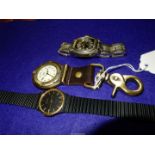 A Montine International black faced quartz movement Wristwatch with gold coloured baton hour