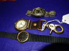 A Montine International black faced quartz movement Wristwatch with gold coloured baton hour