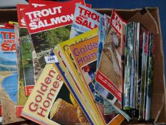 A quantity of Trout and Salmon and Golden Homes magazines