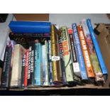 A box of military books including 'The Secret Raiders', 'Royal Marine Commando',