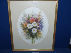 A framed and oval mounted watercolour of a 'Bouquet of Flowers', signed lower left J.