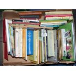 A box of books including geology, The Good Granny Guide, Fred Basset etc.