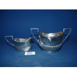 A Silver cream jug and matching two handled sugar basin, Birmingham 1901, maker IL, 162 gms total.