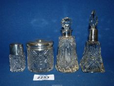 A square based Scent Bottle with silver neck, London 1926, two other scent bottles,