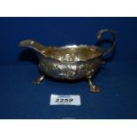 A Georgian Silver sauce boat, London 1757, 122 gms.