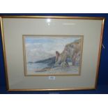 A framed and mounted Watercolour of a coastal scene with a figure on the beach and rugged cliffs,