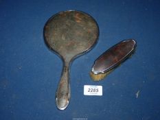 A Silver and Tortoiseshell mirror and brush, Birmingham 1927 and 1932.