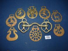 A small quantity of horse brasses and a nickel horse bit.