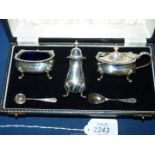 A Silver Cruet with blue glass liners and mustard and salt spoons, Birmingham 1957,