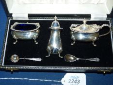 A Silver Cruet with blue glass liners and mustard and salt spoons, Birmingham 1957,