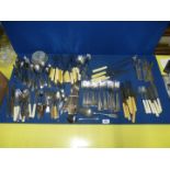 A large quantity of 1940's/1950's cutlery including knives and forks; bone handled,