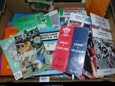 A quantity of Hereford United football programmes, Welsh Rugby programmes etc.