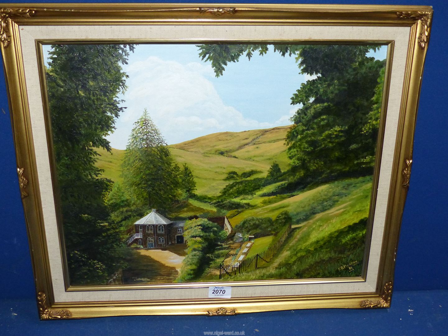 A framed Oil on canvas depicting St. Ann's Well Malvern, signed lower right K.R.