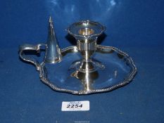 An English silver heavy gauge Chamberstick with removable sconce and snuffer,