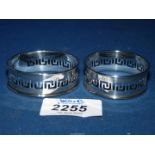 A boxed pair of H.M. silver Birmingham 1928 napkin rings, 20 gms.