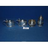 A small quantity of silver condiments including a pair of silver mustard pots, Chester,