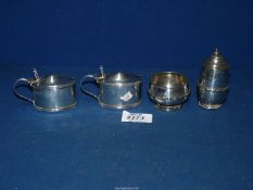 A small quantity of silver condiments including a pair of silver mustard pots, Chester,