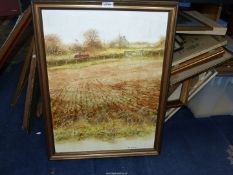 A large Oil on board of a homestead by a ploughed field and a farmer on his tractor,