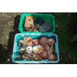 Old clay pots and old bottles, bird feeders, etc.