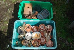 Old clay pots and old bottles, bird feeders, etc.