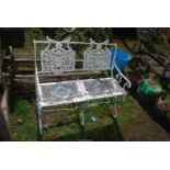 A two seater aluminium garden bench, painted white, 38'' wide x 34'' high.