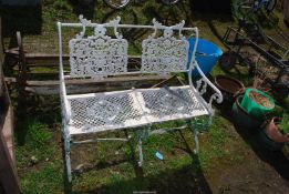 A two seater aluminium garden bench, painted white, 38'' wide x 34'' high.