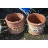 Two round terracotta planters with branch decoration, 19 1/2'' x 15 1/2''.